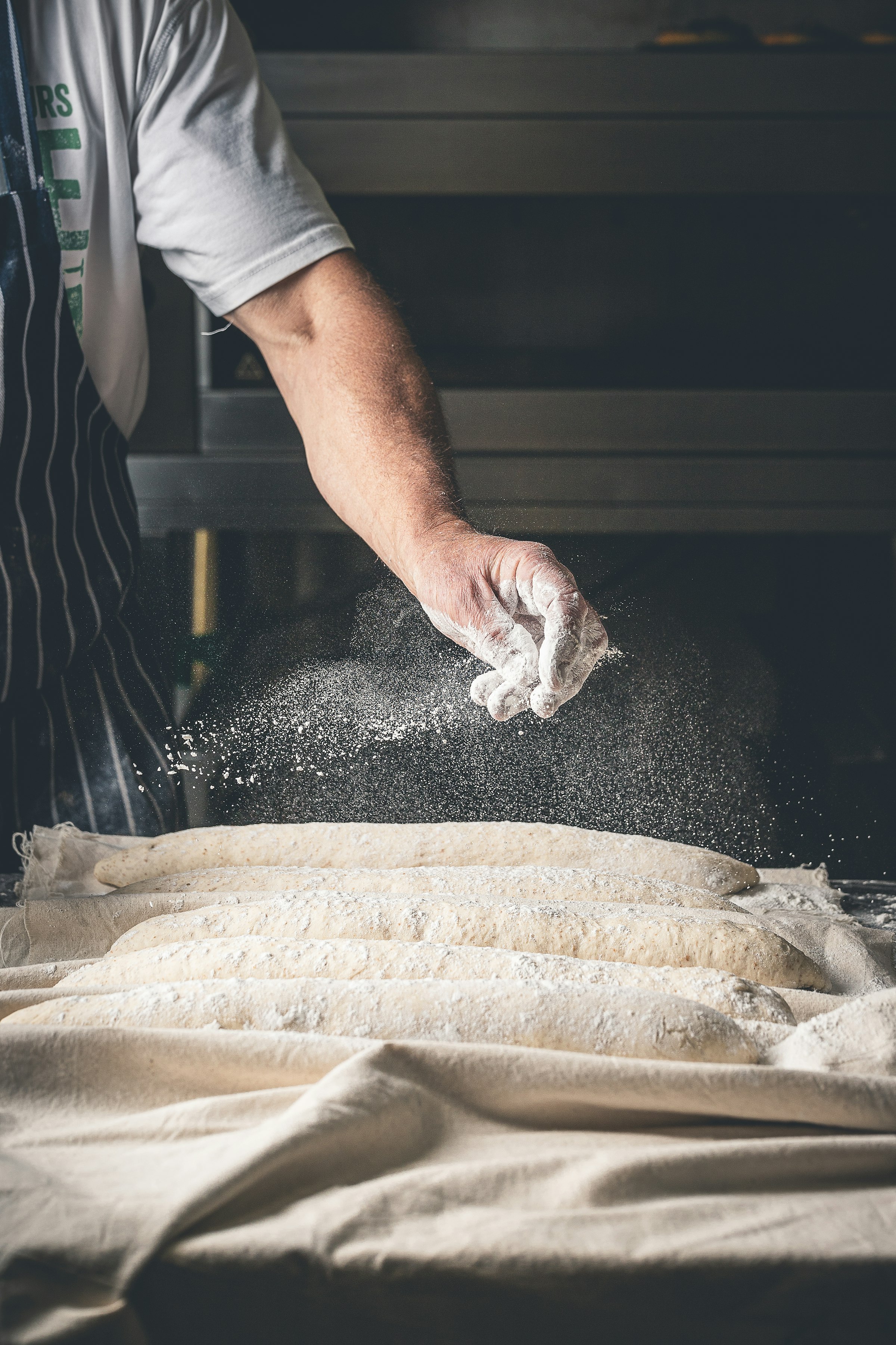 Elena's hands working with flour